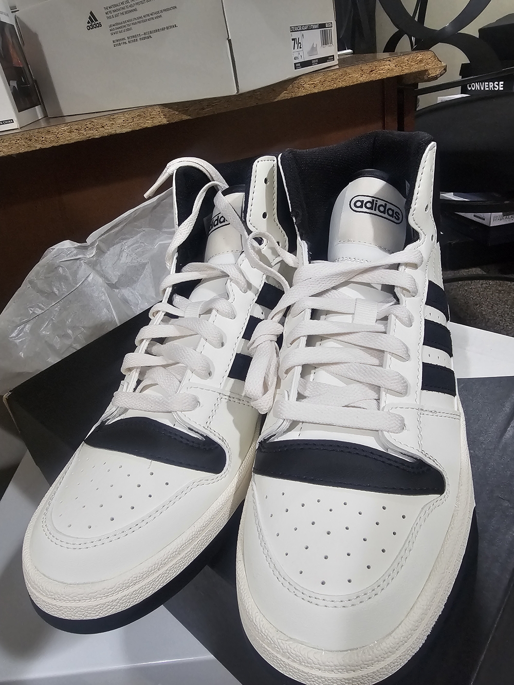 adidas Women’s White and Black High-Top Court-Inspired Sneakers